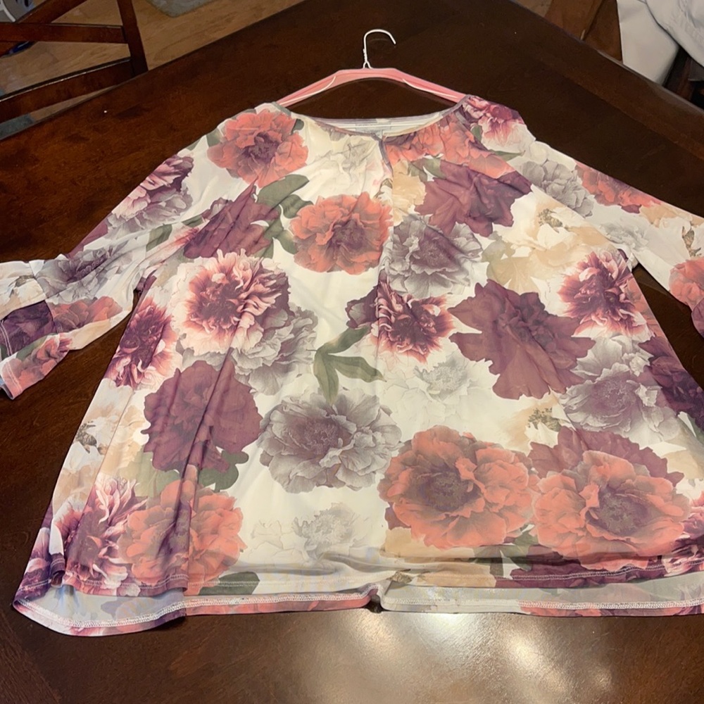 Two Flowers Tops along with a blue Top